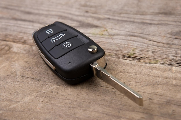 car key with remote alarm control